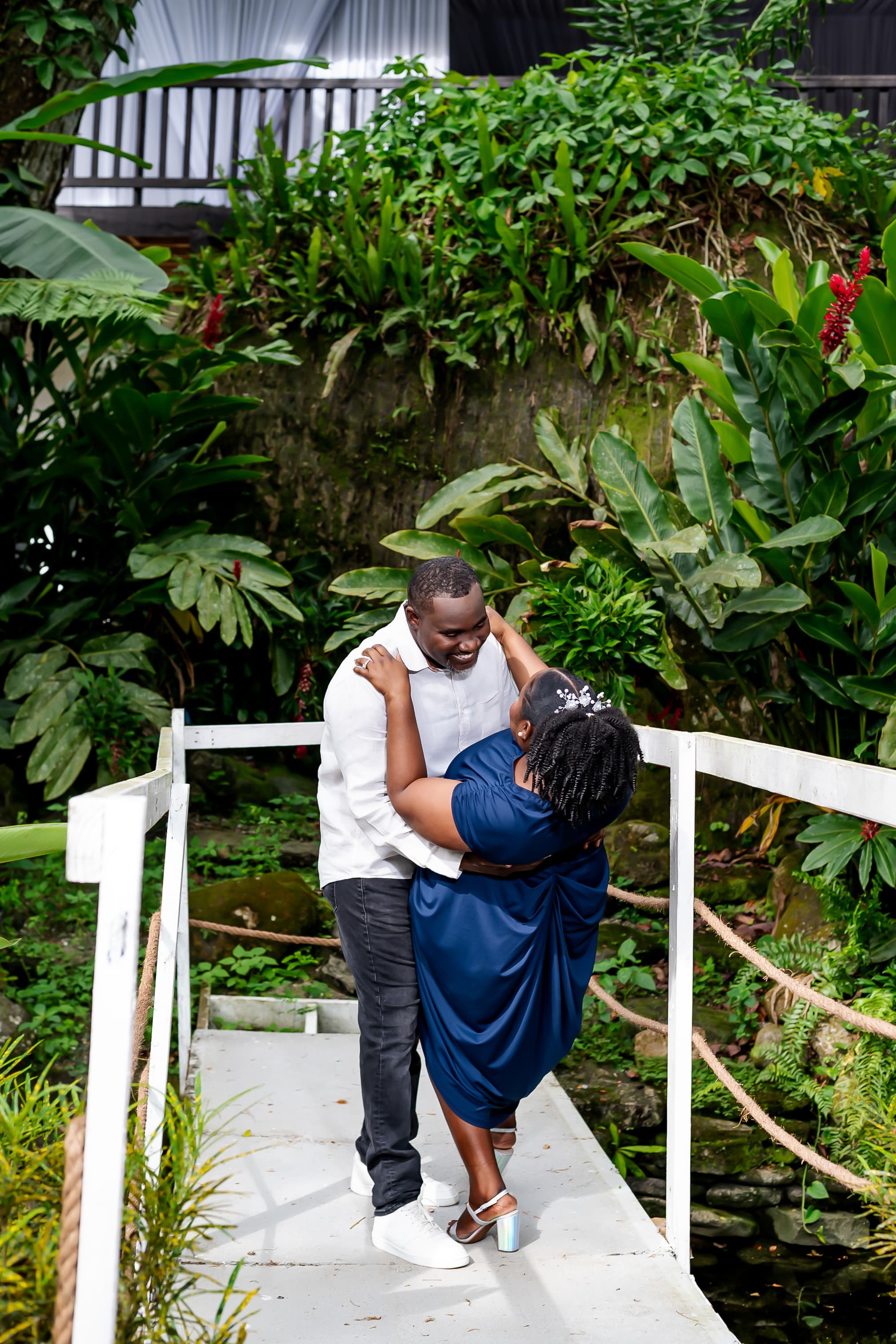 Kerry-Ann and Renado holding hands on the bridge